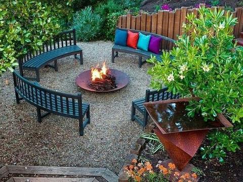 Round fire pit with curved bench