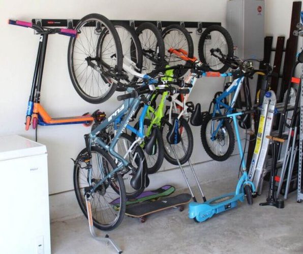 Vertical bike storage on the wall with large amount of bike