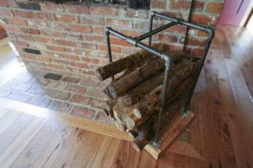 Gas pipe firewood holder